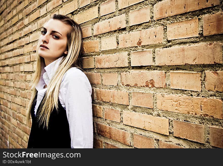 Blond woman on wall