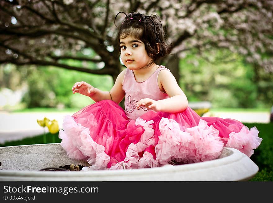 Girl in flower garden