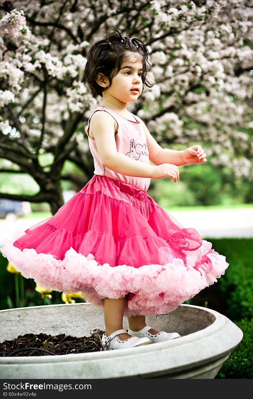 Girl in flower garden