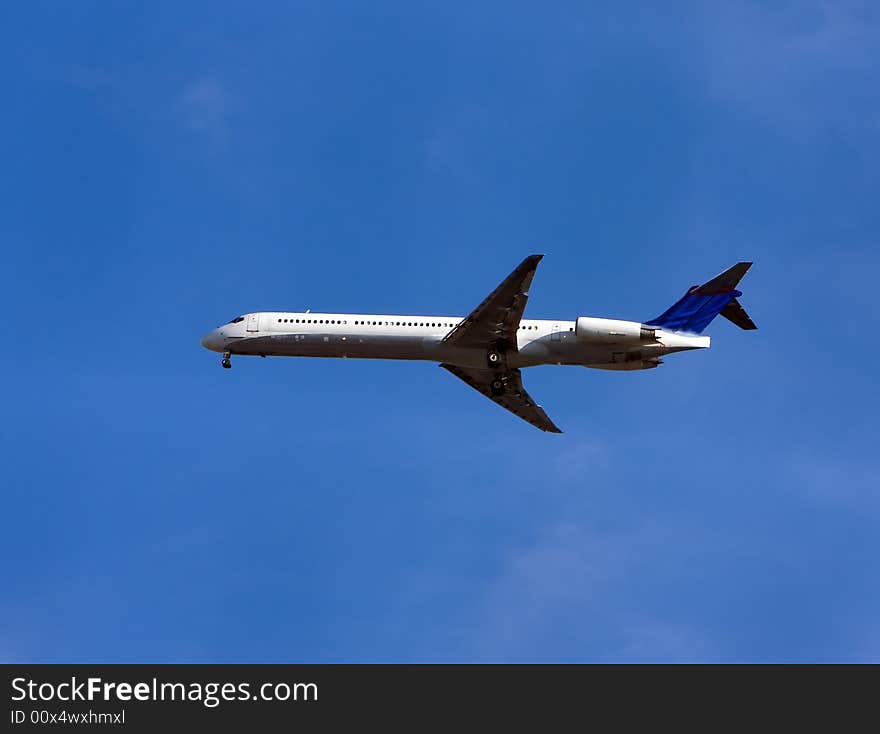 McDonnell Douglas Aircraft Co MD-88 isolated on deep blue sky. McDonnell Douglas Aircraft Co MD-88 isolated on deep blue sky