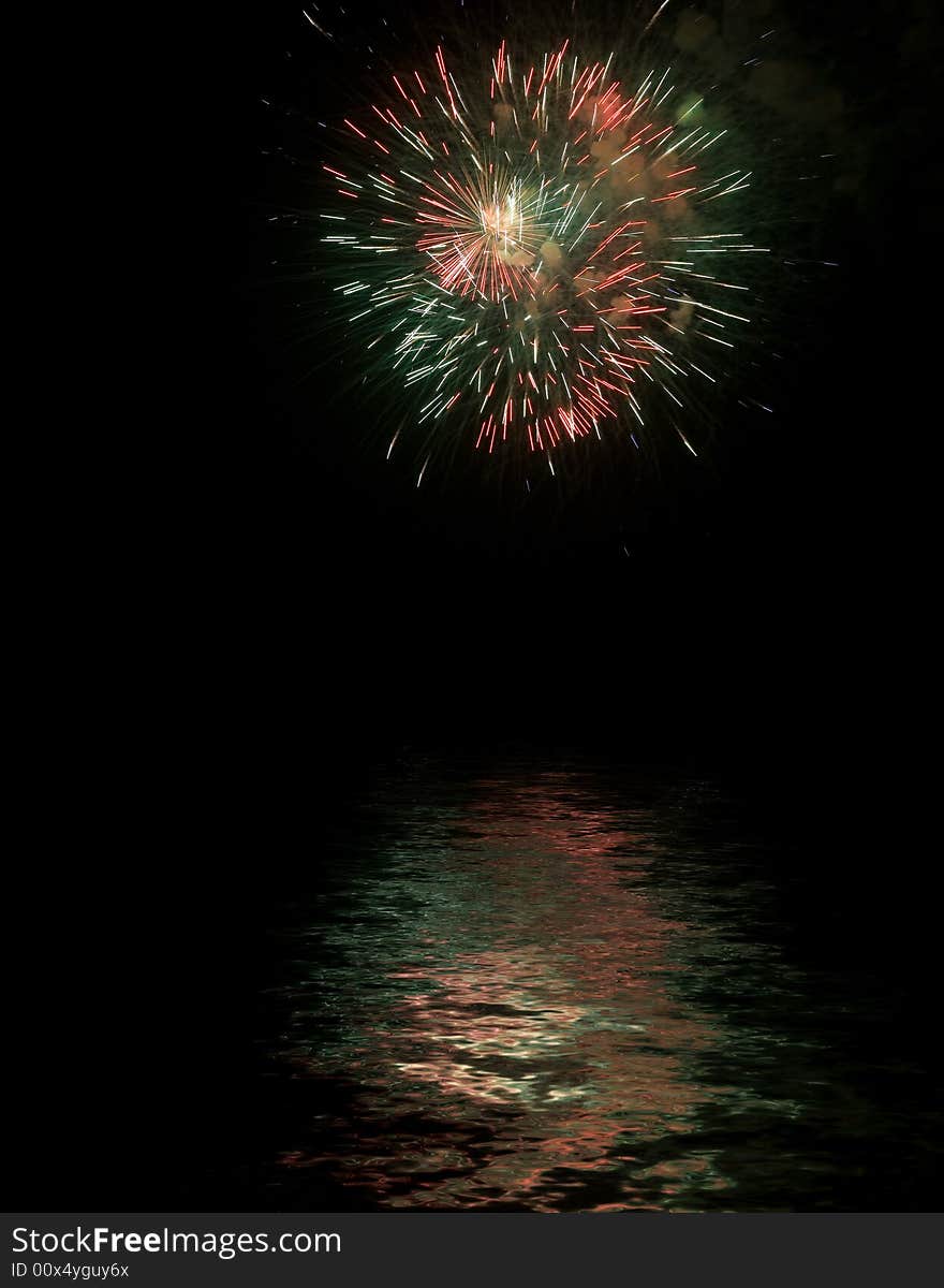 Fireworks with reflexes on water