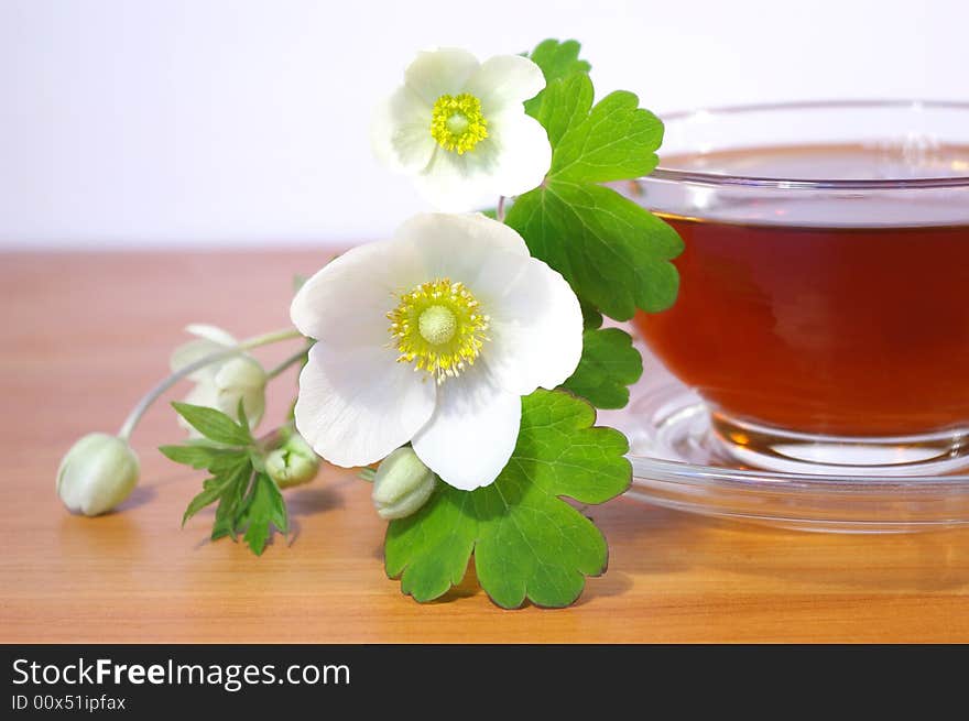 Bouquet of spring flowers and cup of tea. Bouquet of spring flowers and cup of tea