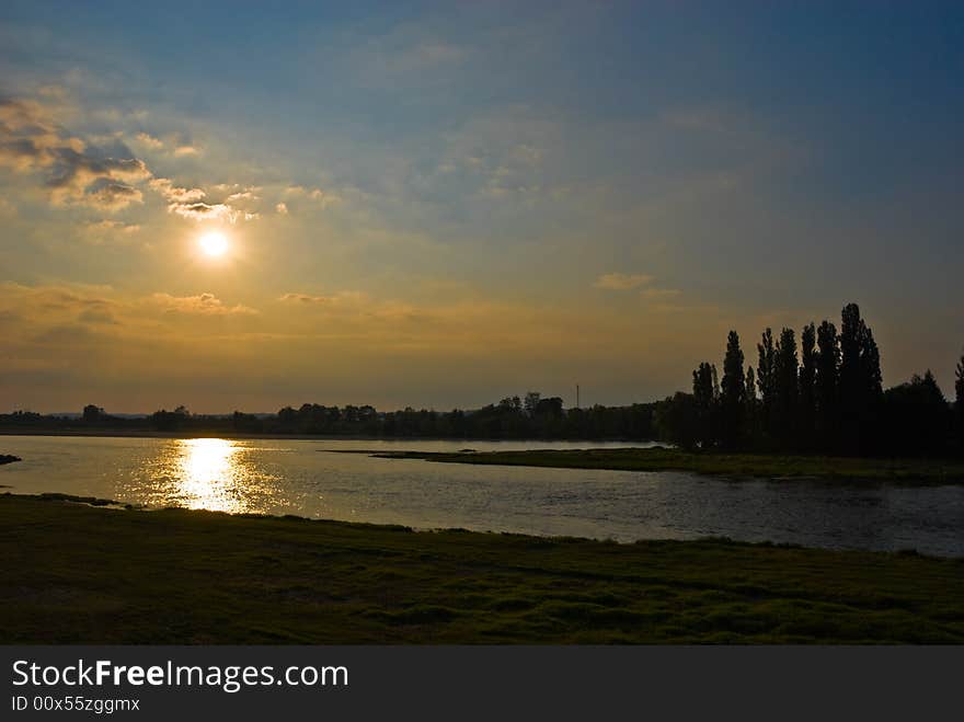 Sun creating a trace on the water of Loire river, France. Sun creating a trace on the water of Loire river, France.