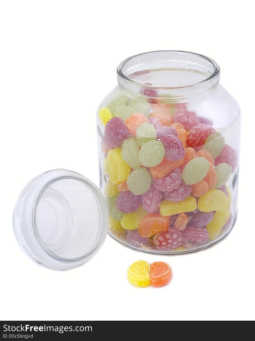 Multicolor bonbons in glass pot