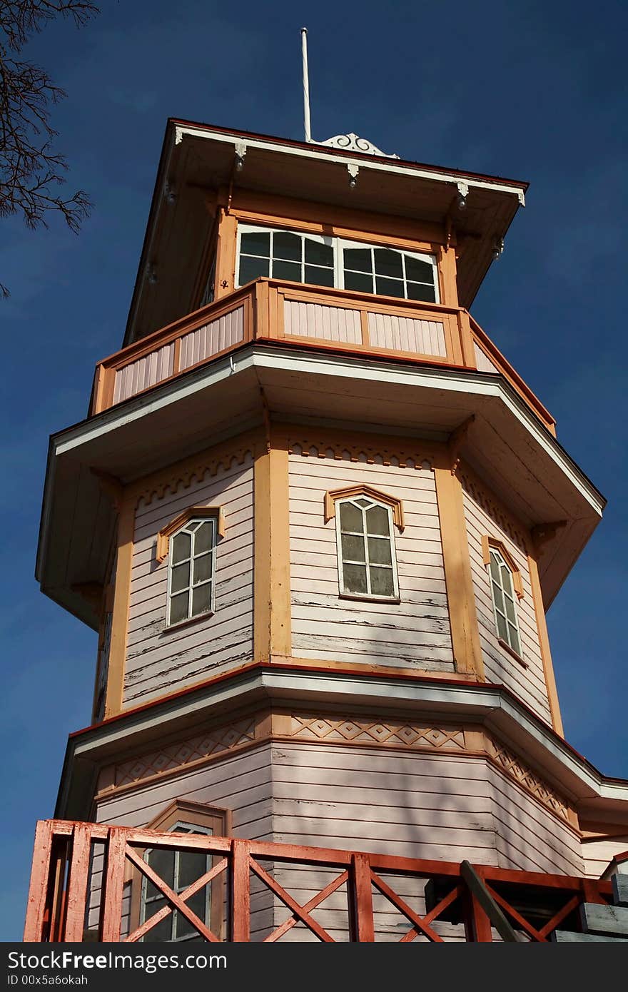 Wooden building in sunshine against blue sky, Finland. Wooden building in sunshine against blue sky, Finland