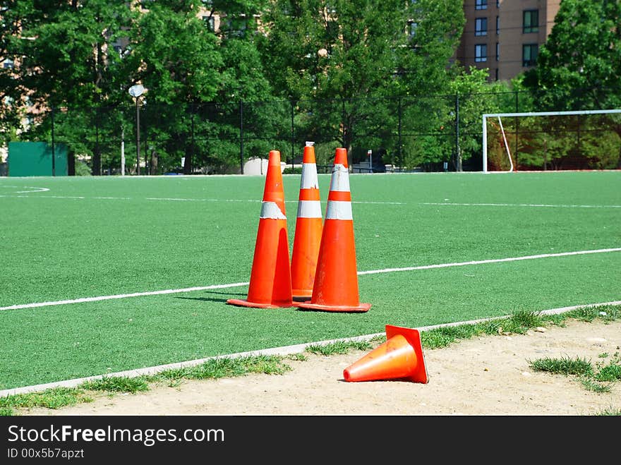 Repair signs near a football field. Repair signs near a football field.