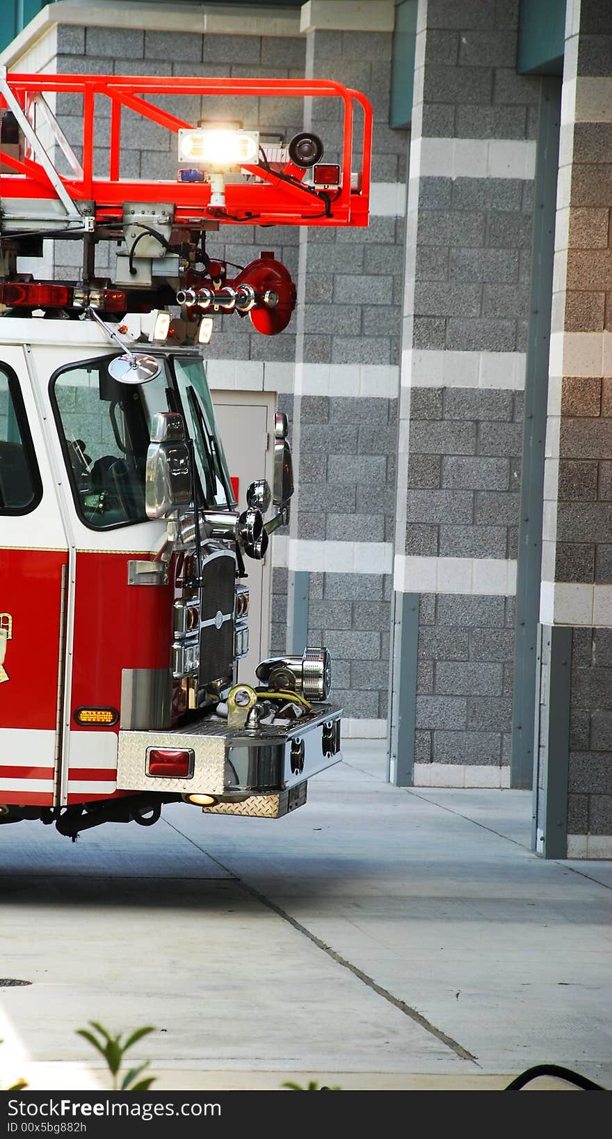 The fire machine at a gate of fire station. The fire machine at a gate of fire station.