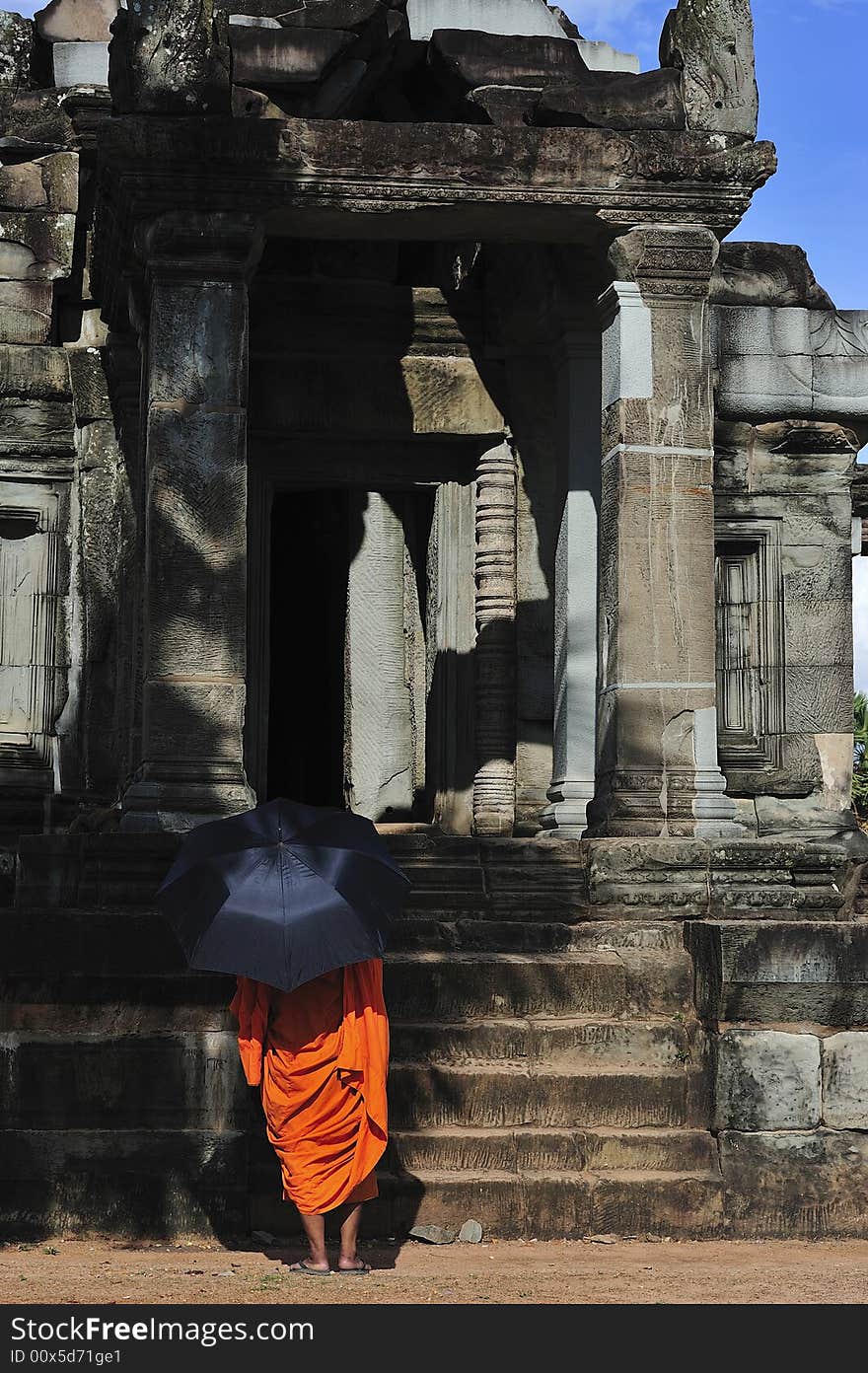 Cambodia Angkor wat with a monk