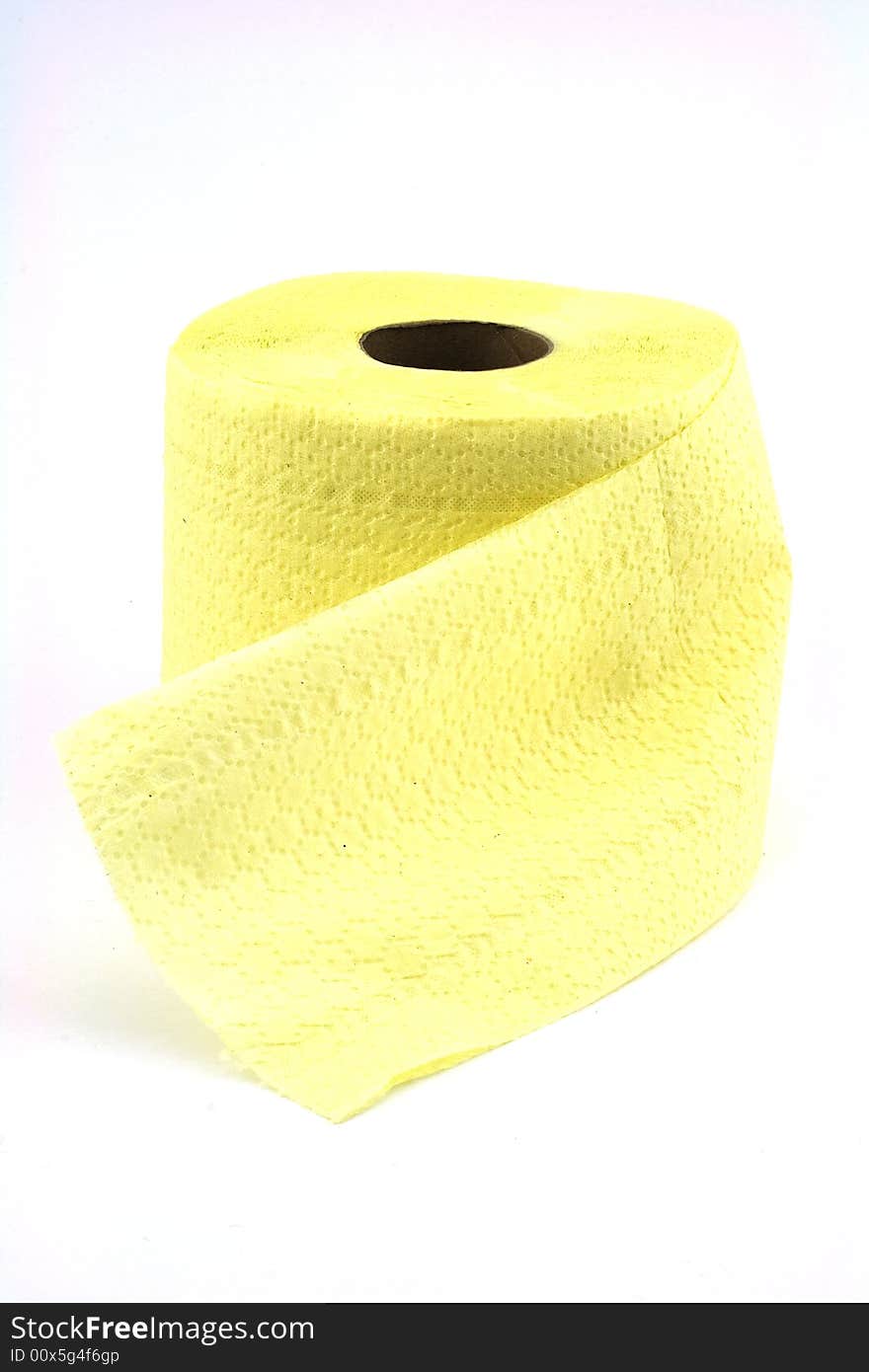 Isolated photo of roll of yellow toilet paper