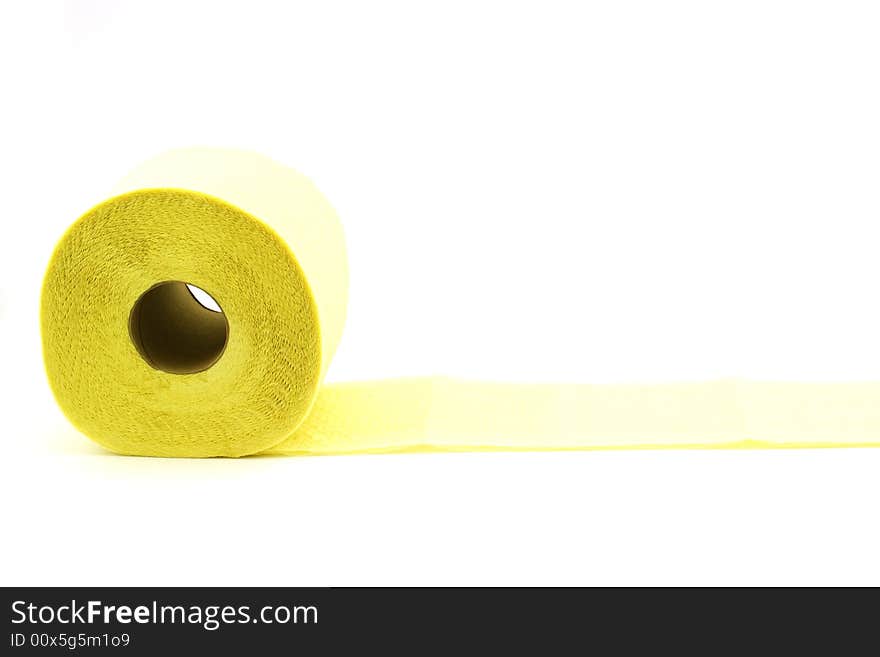 Isolated photo of roll of yellow toilet paper