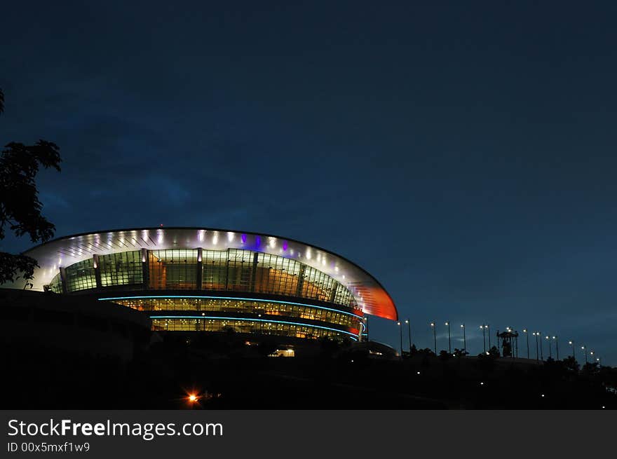 Night scene with special design modern colorful building. Night scene with special design modern colorful building