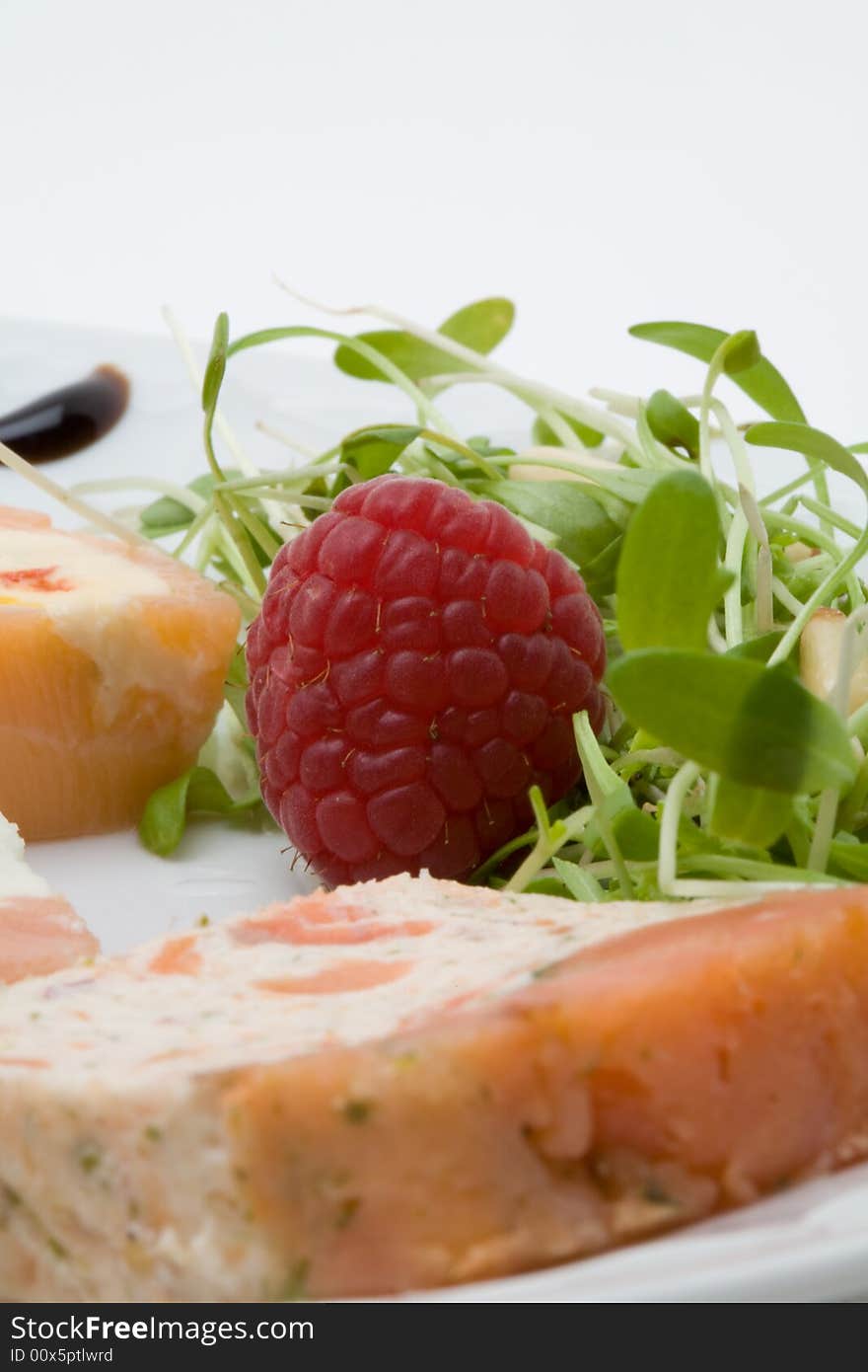 Decorated salmon cream appetizer closeup