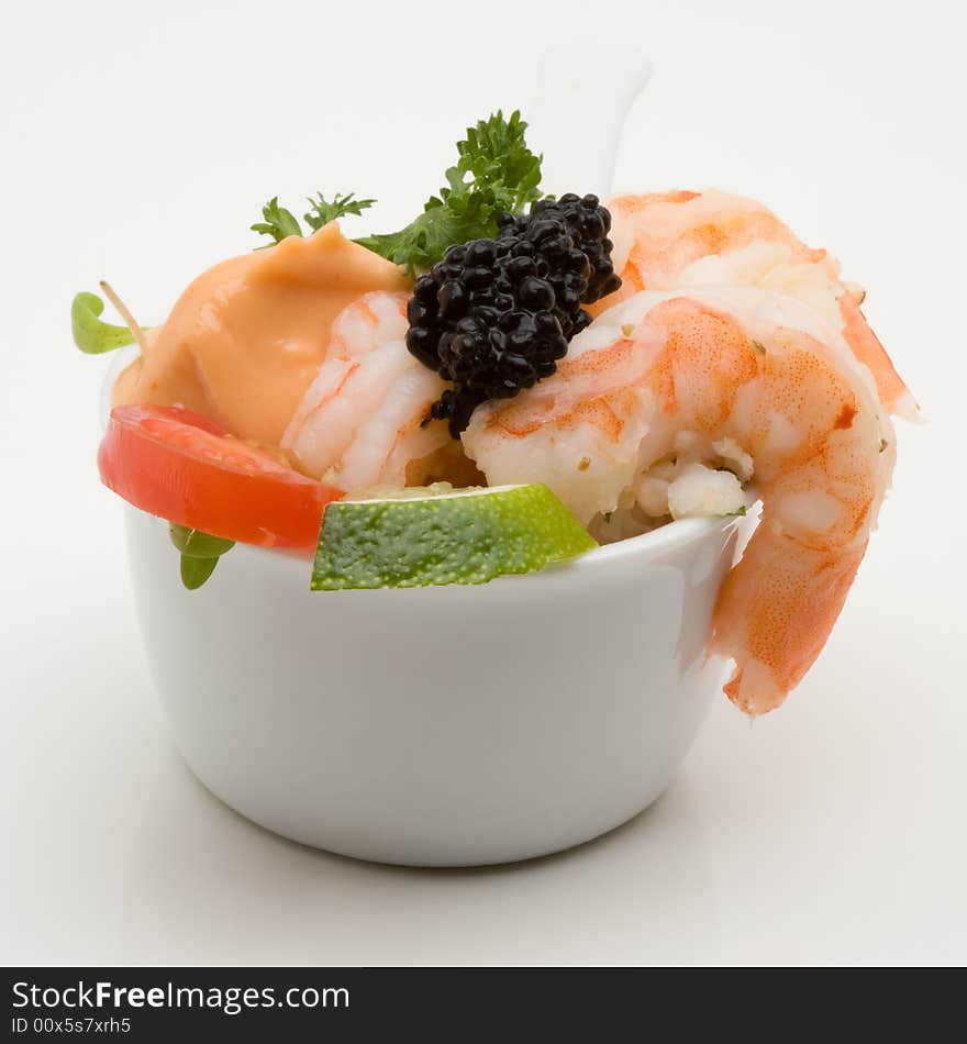 Prawn appetizer with caviar in a little bowl