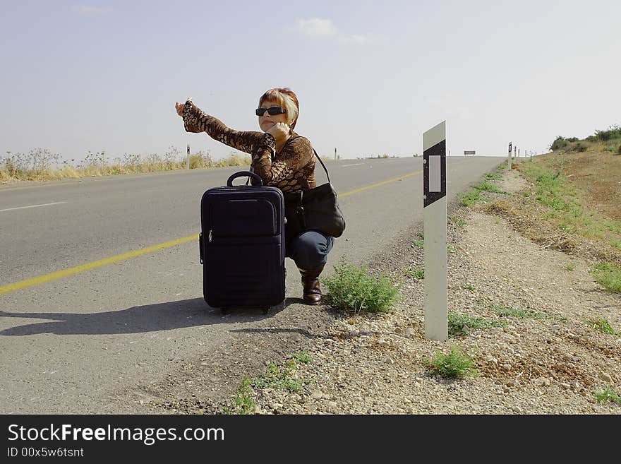 Hitchhiking woman