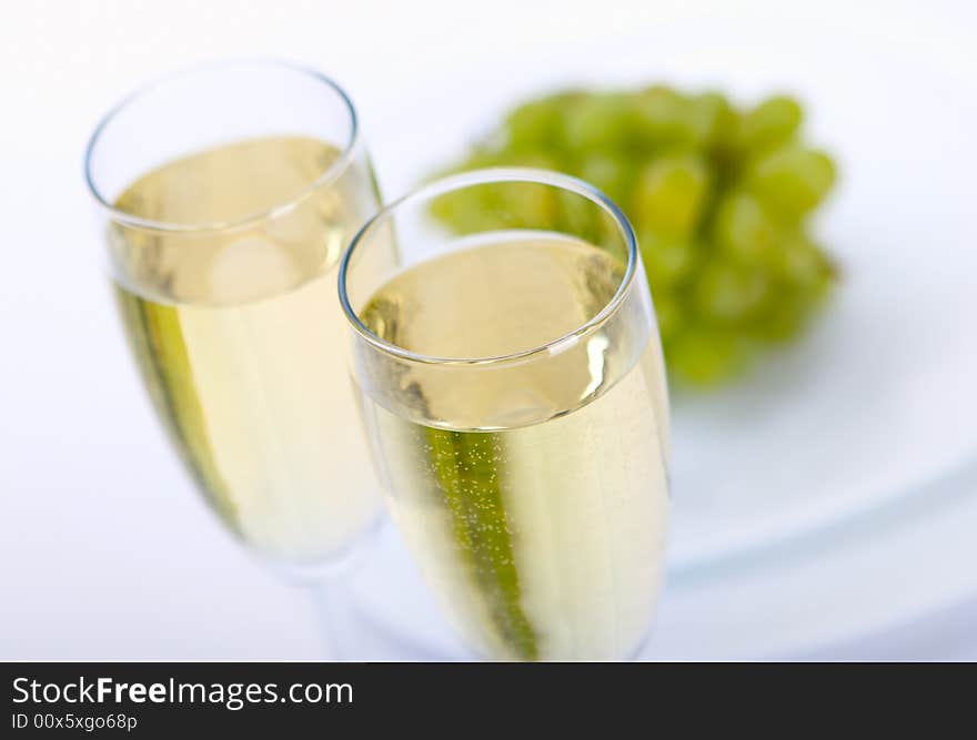 Glass of wine with grape close up