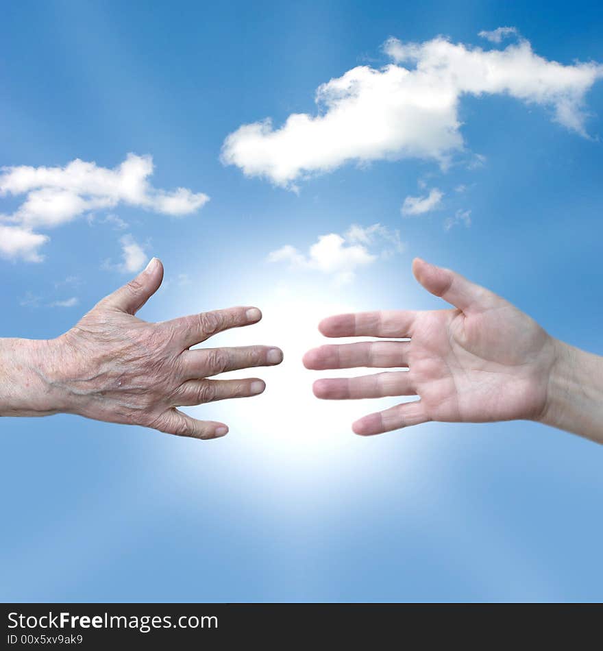 Two hands to the sky background