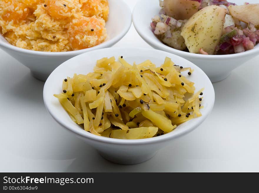 Indian food in different bowls