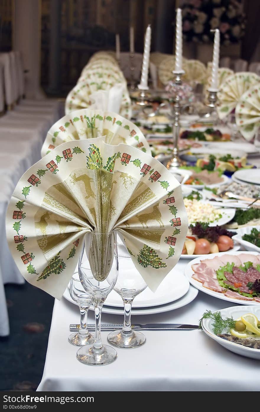 all ready for a banquet table covered, waiting for guests. all ready for a banquet table covered, waiting for guests