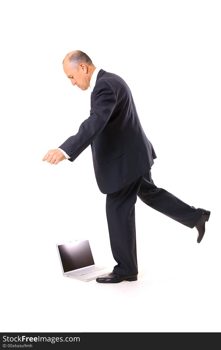 Businessman Kicking His Laptop