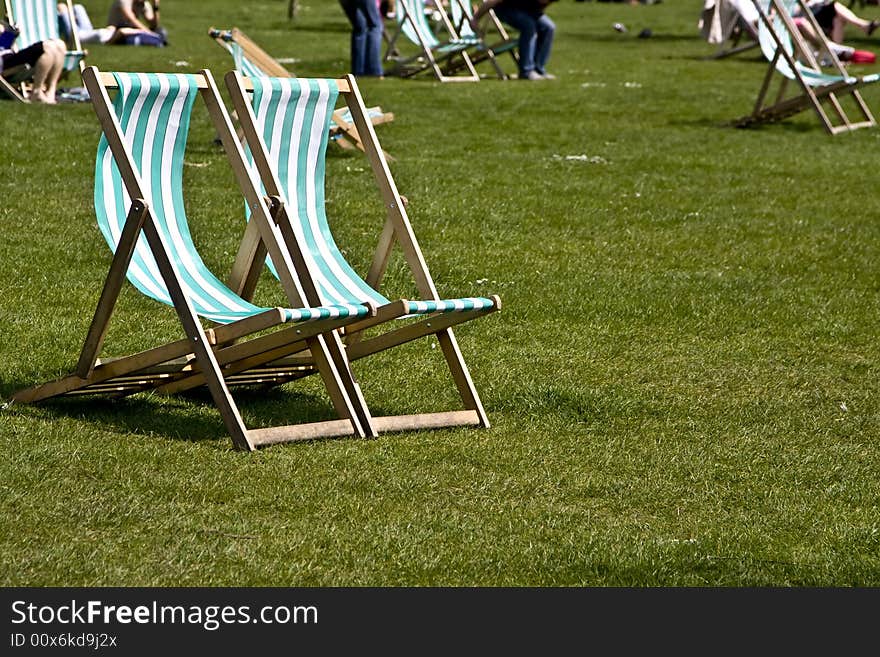 Empty deck chairs at Hyde London Park. Empty deck chairs at Hyde London Park