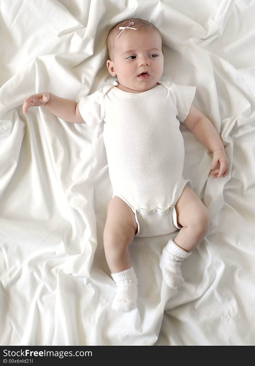 Baby on White Blanket