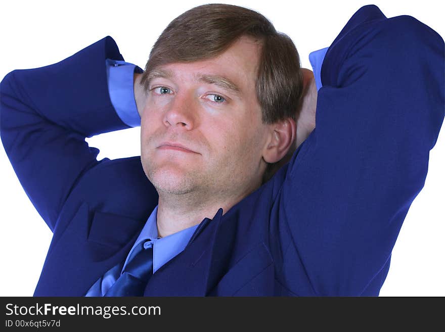 Handsome businessman relaxing in his chair, thinking. Handsome businessman relaxing in his chair, thinking