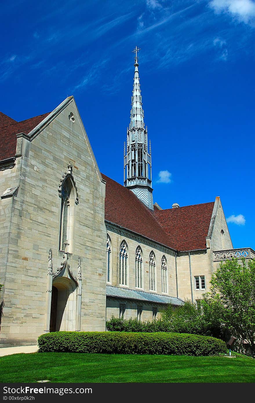 This picture was taken at a church in Indianapolis. Gothic architecture is a style of architecture which flourished during the high and late medieval period. It evolved from Romanesque architecture and was succeeded by Renaissance architecture. Originating in 12th-century France and lasting into the 16th century, Gothic architecture was known during the period as the French Style (Opus Francigenum), with the term Gothic first appearing during the latter part of the Renaissance as a stylistic insult. Its characteristic features include the pointed arch, the ribbed vault and the flying buttress. Gothic architecture is most familiar as the architecture of many of the great cathedrals, abbeys and parish churches of Europe. It is also the architecture of many castles, palaces, town halls, guild halls, universities, and to a less prominent extent, private dwellings. It is in the great churches and cathedrals and in a number of civic buildings that the Gothic style was expressed most powerfully, its characteristics lending themselves to appeal to the emotions. A great number of ecclesiastical buildings remain from this period, of which even the smallest are often structures of architectural distinction while many of the larger churches are considered priceless works of art and are listed with UNESCO as World Heritage Sites. For this reason a study of Gothic architecture is largely a study of cathedrals and churches. This picture was taken at a church in Indianapolis. Gothic architecture is a style of architecture which flourished during the high and late medieval period. It evolved from Romanesque architecture and was succeeded by Renaissance architecture. Originating in 12th-century France and lasting into the 16th century, Gothic architecture was known during the period as the French Style (Opus Francigenum), with the term Gothic first appearing during the latter part of the Renaissance as a stylistic insult. Its characteristic features include the pointed arch, the ribbed vault and the flying buttress. Gothic architecture is most familiar as the architecture of many of the great cathedrals, abbeys and parish churches of Europe. It is also the architecture of many castles, palaces, town halls, guild halls, universities, and to a less prominent extent, private dwellings. It is in the great churches and cathedrals and in a number of civic buildings that the Gothic style was expressed most powerfully, its characteristics lending themselves to appeal to the emotions. A great number of ecclesiastical buildings remain from this period, of which even the smallest are often structures of architectural distinction while many of the larger churches are considered priceless works of art and are listed with UNESCO as World Heritage Sites. For this reason a study of Gothic architecture is largely a study of cathedrals and churches.