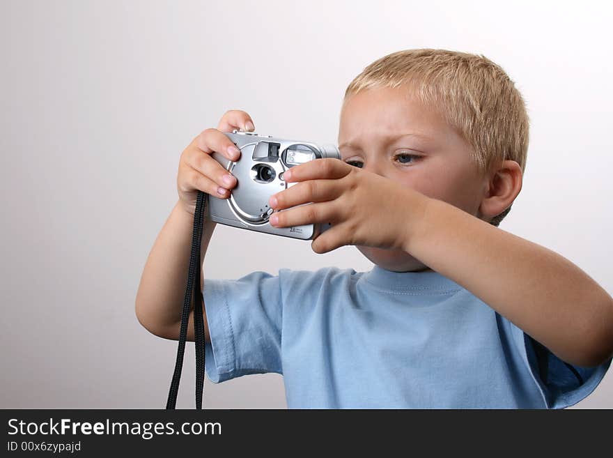 Young photographer busy taking photos