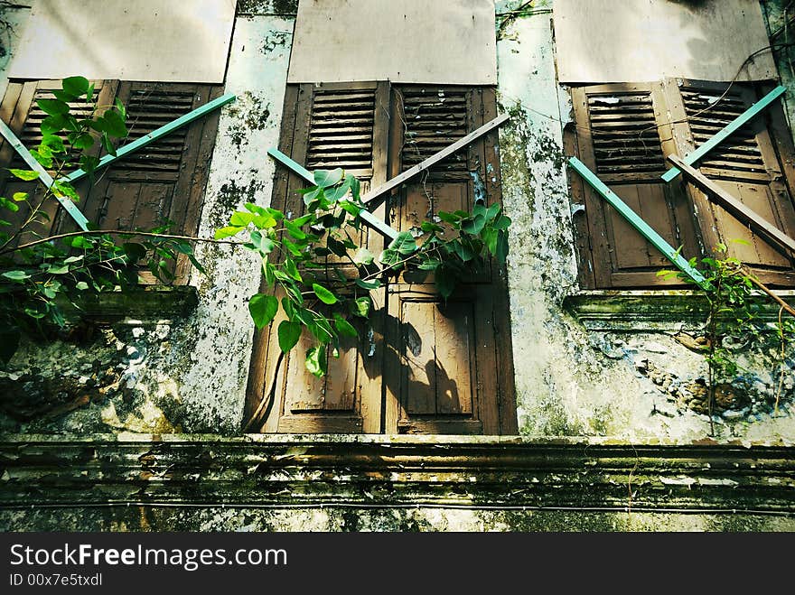 Three windows in old residential area