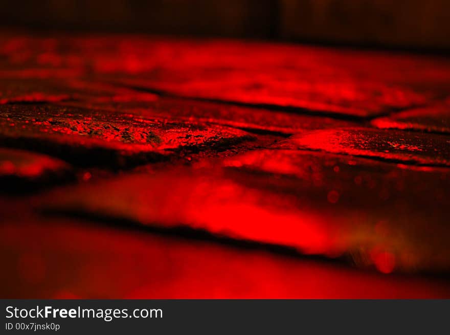 Old red pavement by night