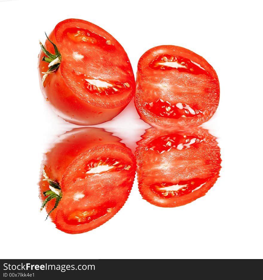 Fresh tomato isolated on white - water reflection. Fresh tomato isolated on white - water reflection
