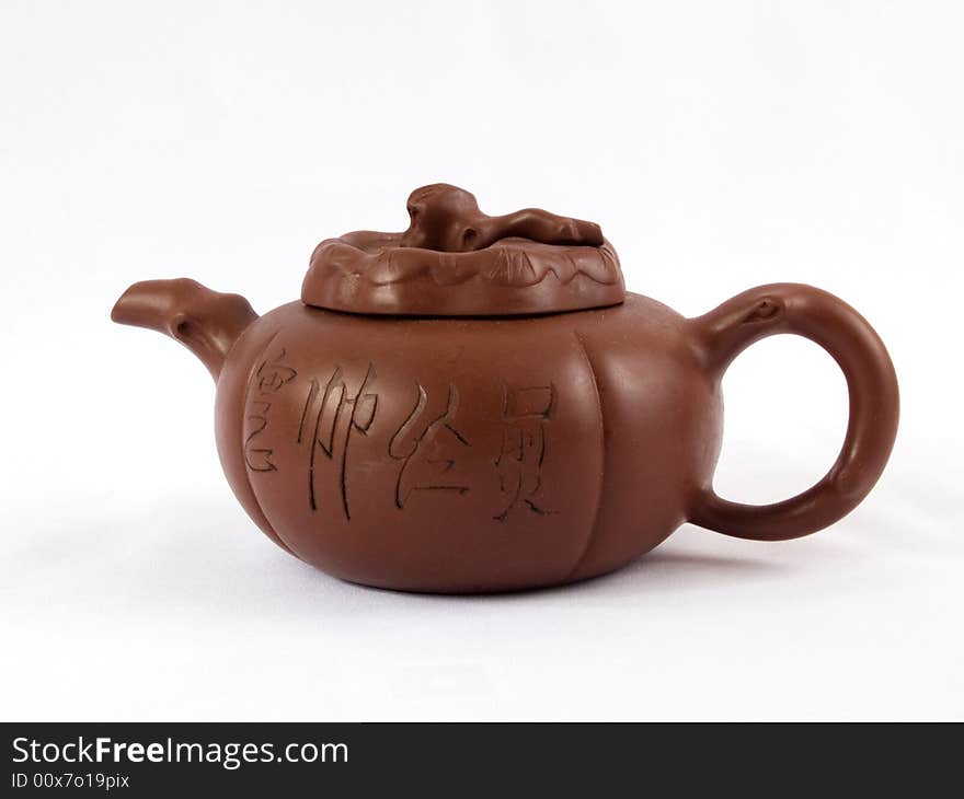 Chinese ceramic teapot decorating hieroglyphs on white background. Chinese ceramic teapot decorating hieroglyphs on white background