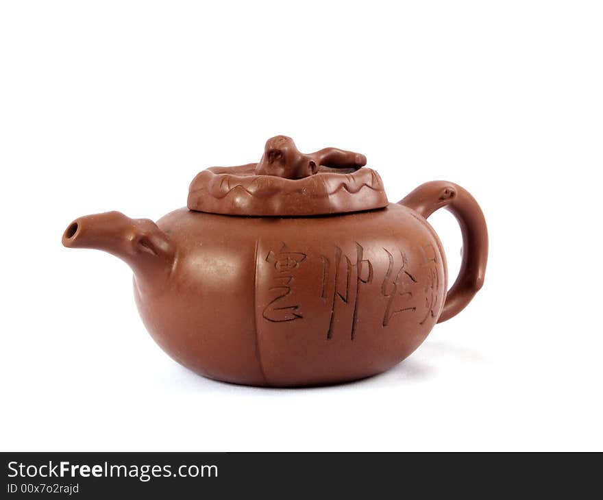 Chinese ceramic teapot decorating hieroglyphs on white background