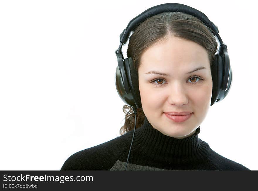 Woman in head phones on white background