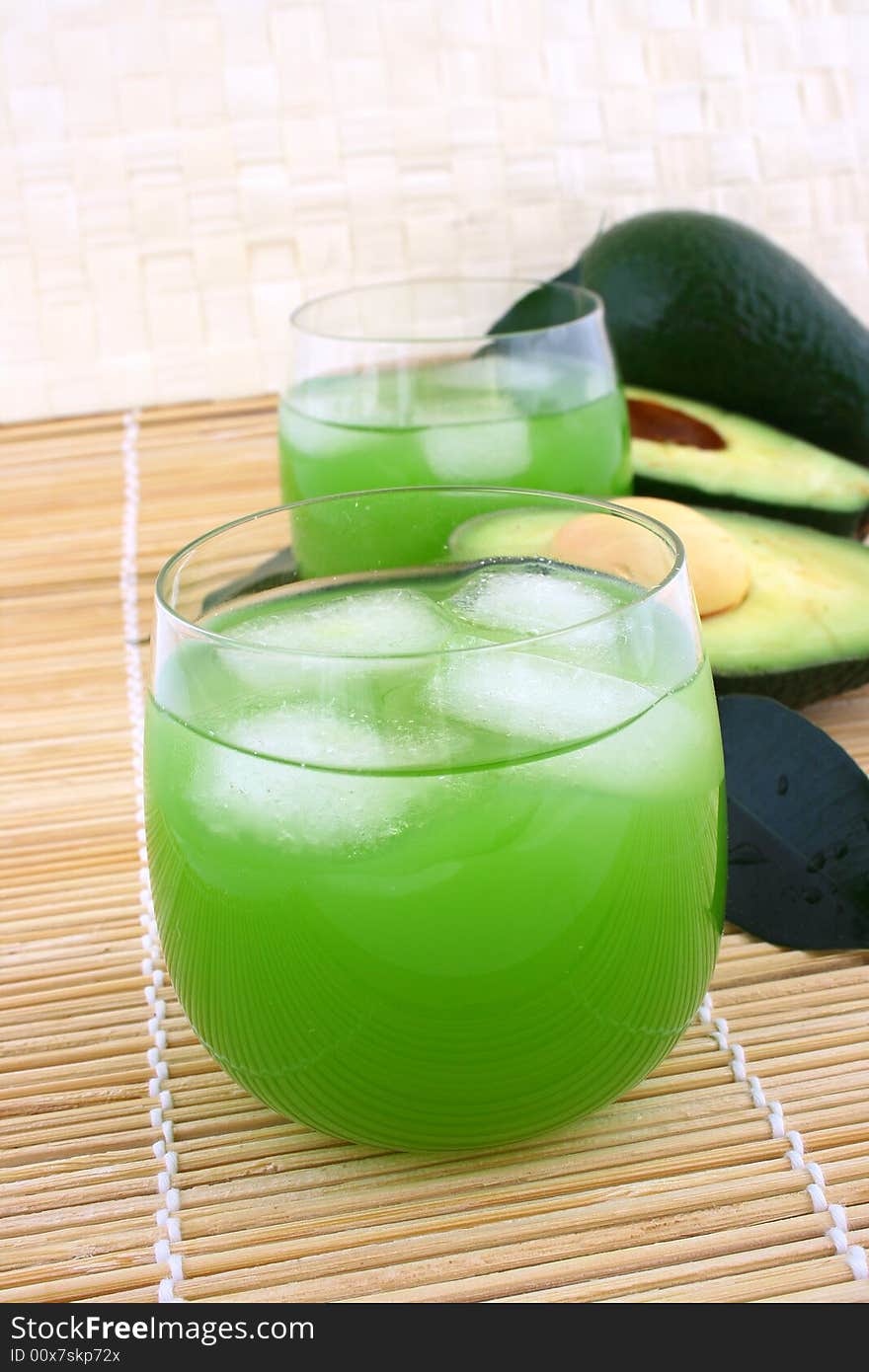 Avocado and avocado juice in a glass