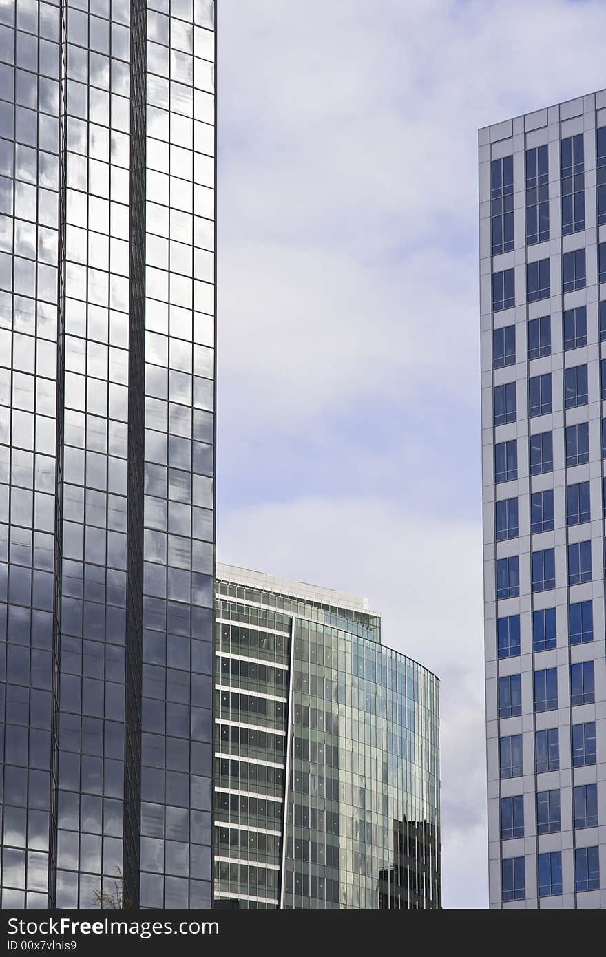 Glass modern office buildings with reflection in a modern downtown