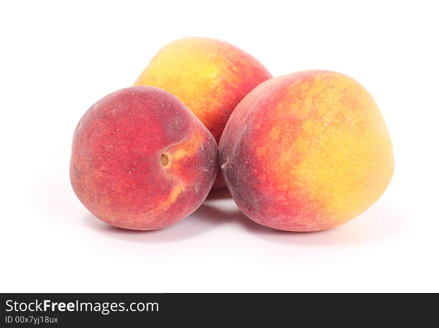 Three tasty juicy peaches