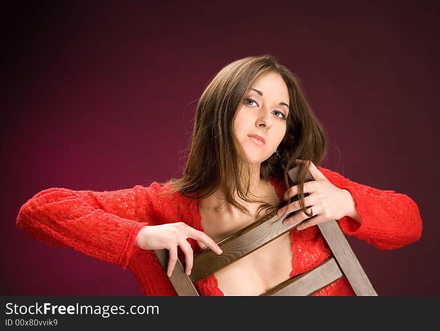 Girl portrait. dark red background