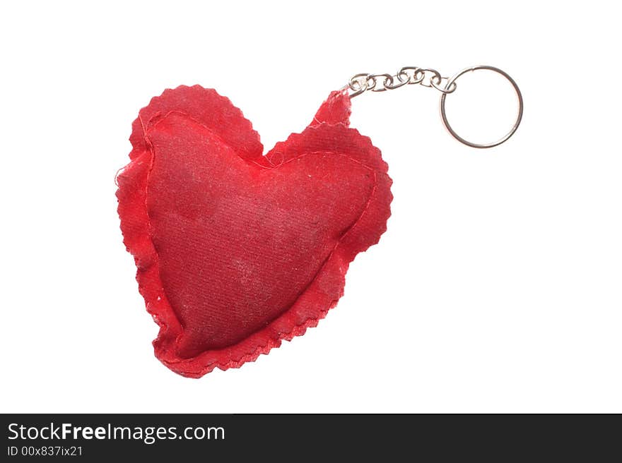 Used chained heart over white background