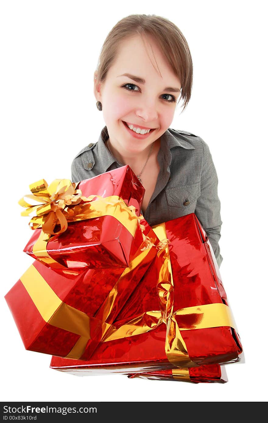 Portrait of a young woman with gifts. Shot in studio. Portrait of a young woman with gifts. Shot in studio.