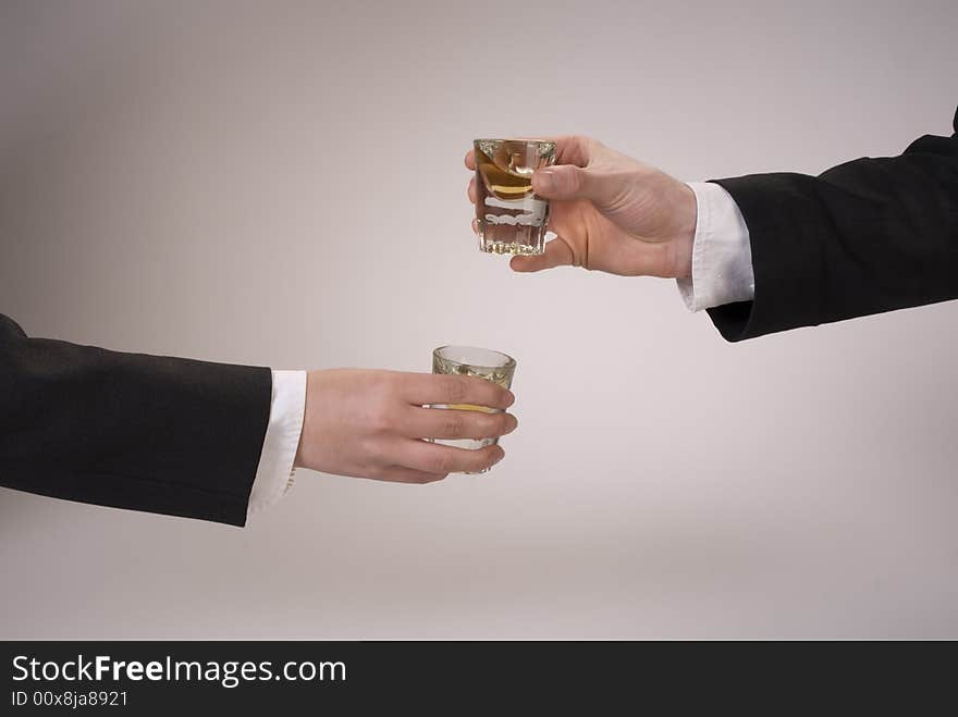 Two business men toast it. Two business men toast it