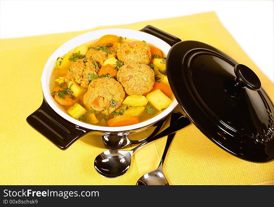 Homemade meatball soup served in a bowl