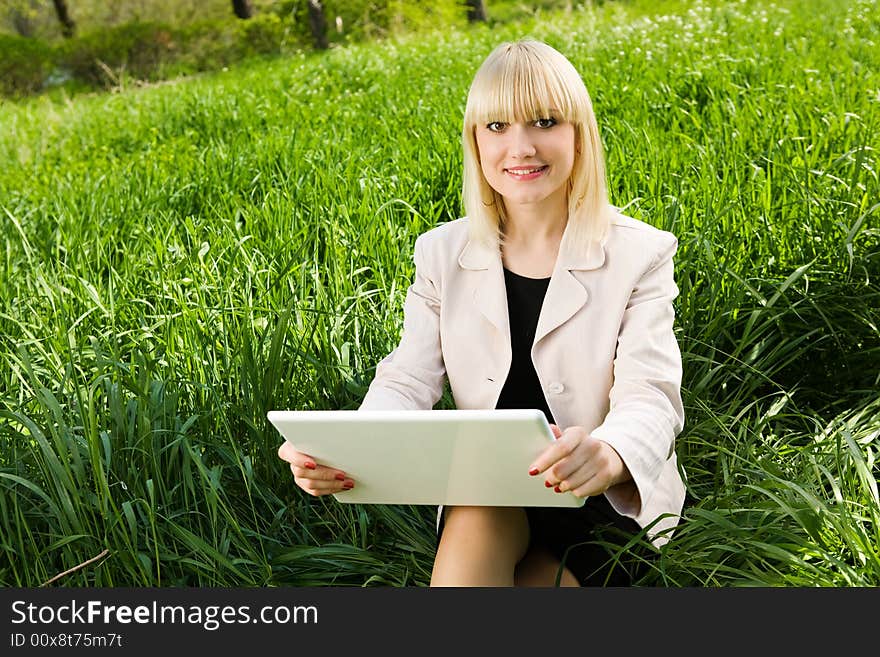 Smiling girl and notebook