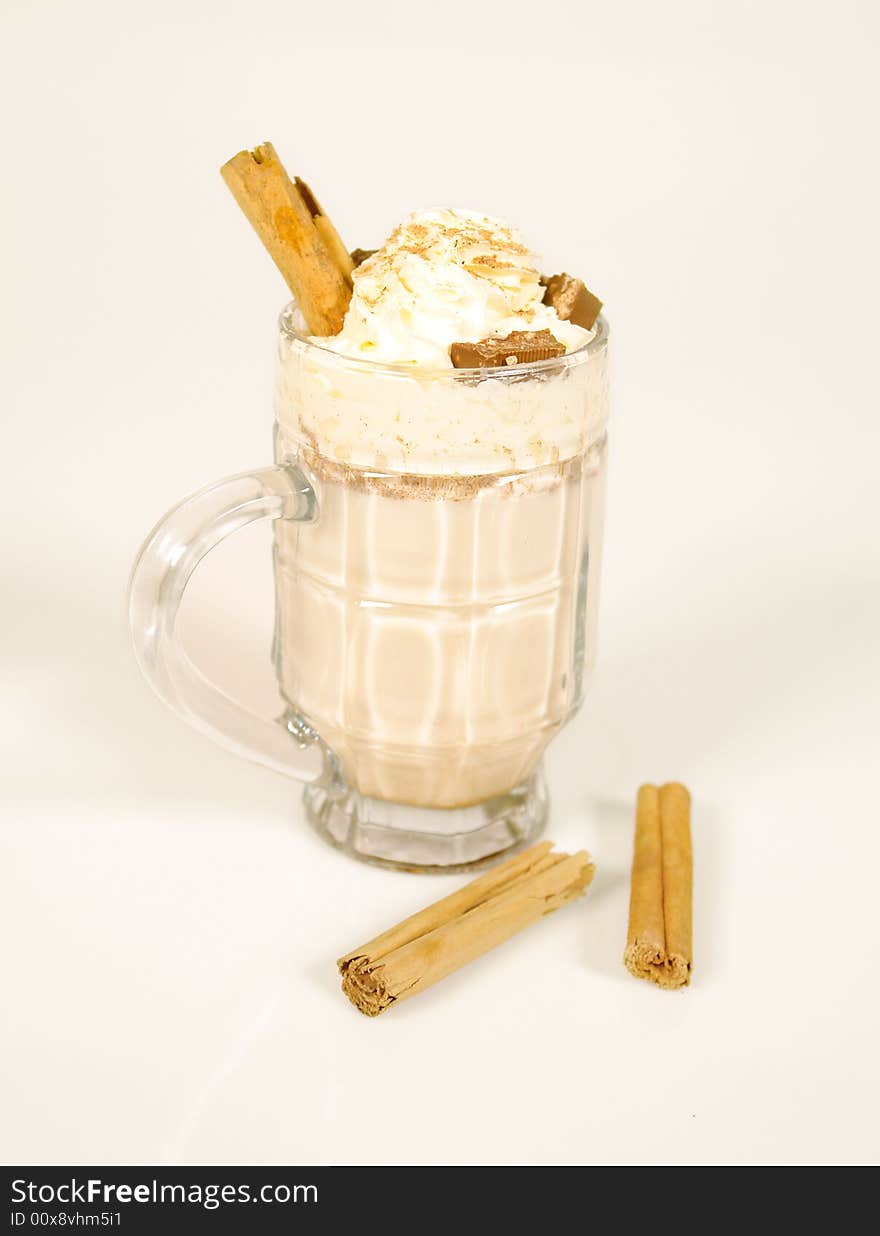 Irish coffee beverage with whipped cream and chocolate