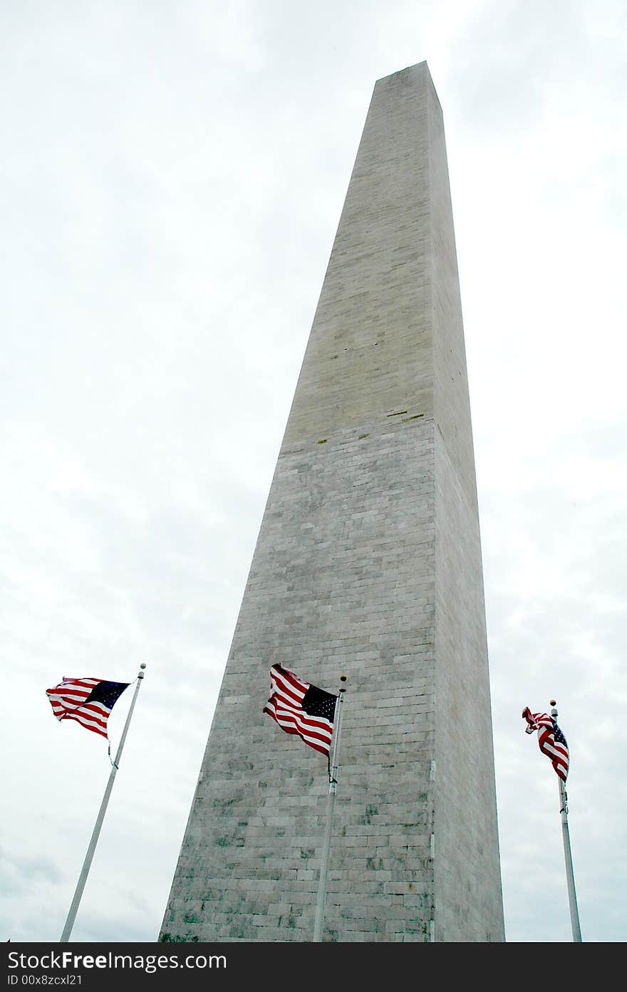 This was taken in Washington DC from the from outside the Washington Monument which has American flags circling it. This was taken in Washington DC from the from outside the Washington Monument which has American flags circling it.