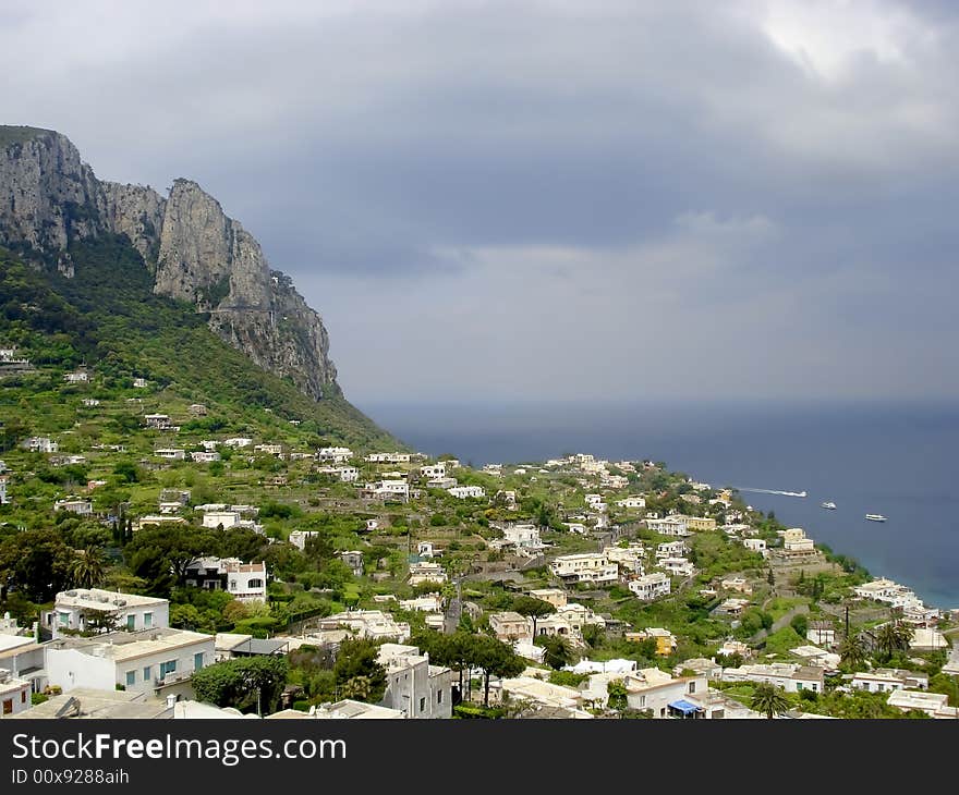 Capri countryside viewed from high above looking down on the rocky coast line. Capri countryside viewed from high above looking down on the rocky coast line.