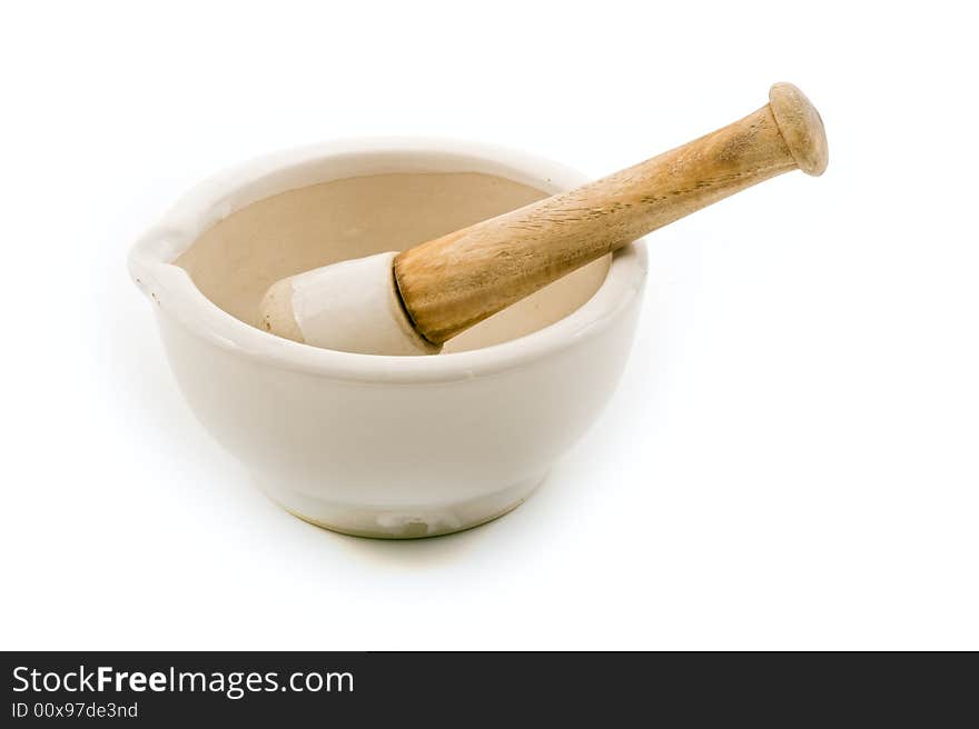 Ceramic mortar and pestle isolated on white