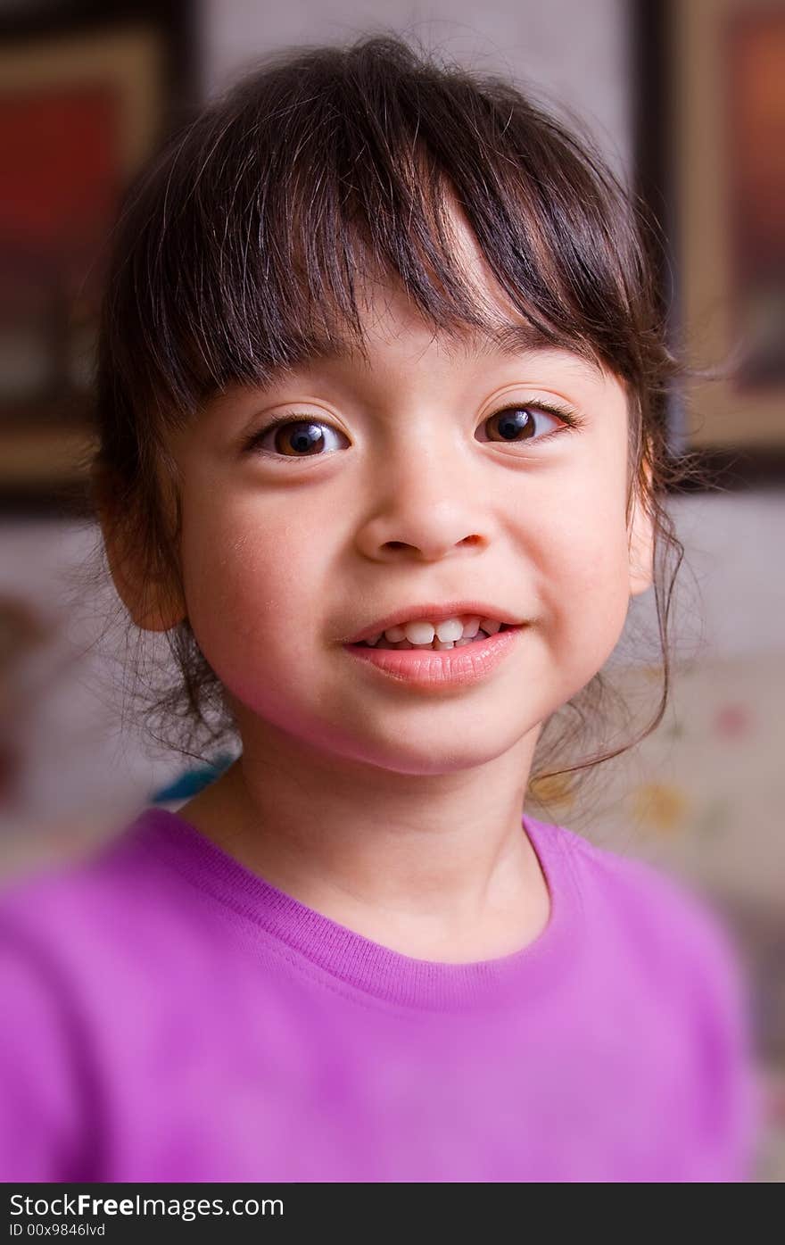 A cute and adorable little girl in smiling. A cute and adorable little girl in smiling.