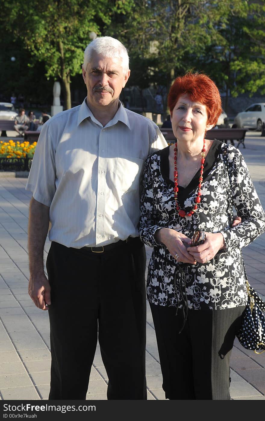 A happy senior couple outdoors. They are still in love after many years together. A happy senior couple outdoors. They are still in love after many years together.