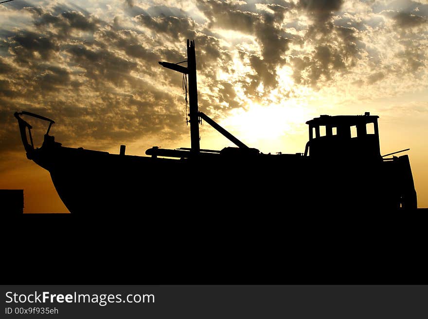 Beautiful sunset and fishing boat